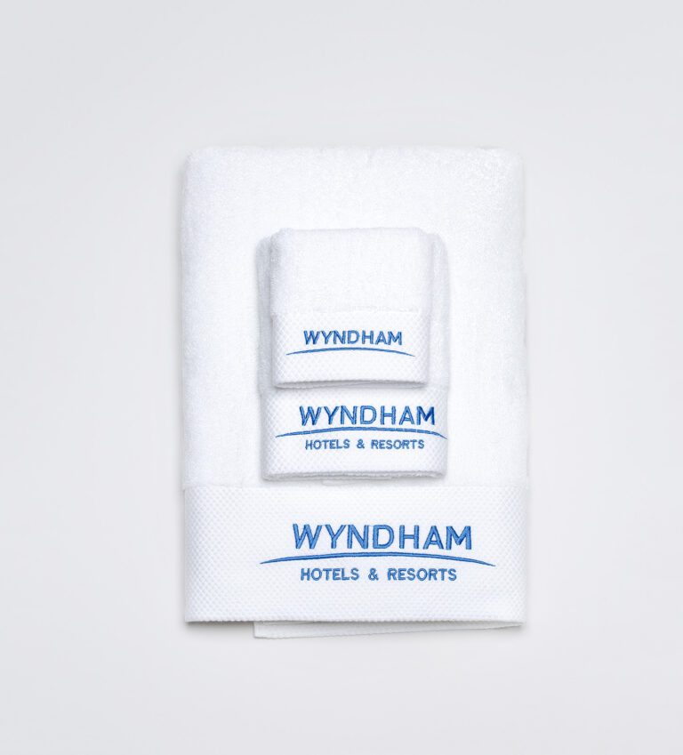 Custom Hotel Towels – WYNDHAM Logo on White Satin-Edged Towels