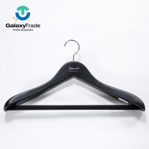 A professional product shot of a single Custom Kempinski Branded Solid Wood Suit Hanger in a matte black finish.