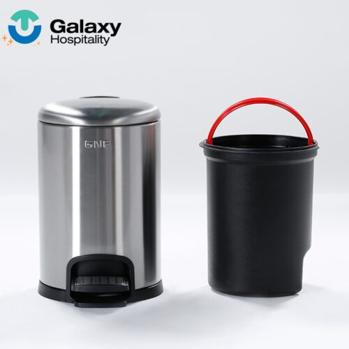 A professional product shot of a Domed Stainless Steel Step Trash Can next to its removable black inner bucket featuring a bright red handle.