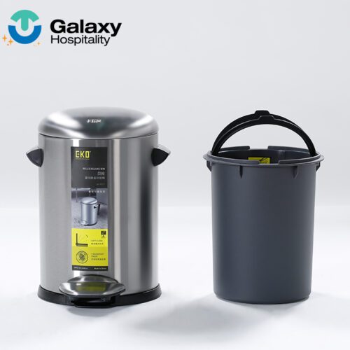 A professional shot of a Stainless Steel Step Trash Can next to its removable grey plastic inner bucket.