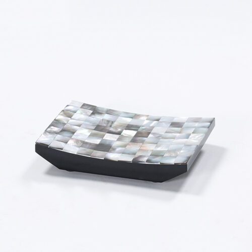 A professional studio photograph of a Natural Shell Inlay Curved Soap Dish with an iridescent mosaic surface and a solid black base.