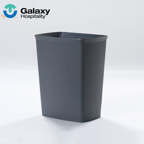 A professional studio photograph of a rectangular Leather-Textured Waste Basket in a deep matte grey finish.