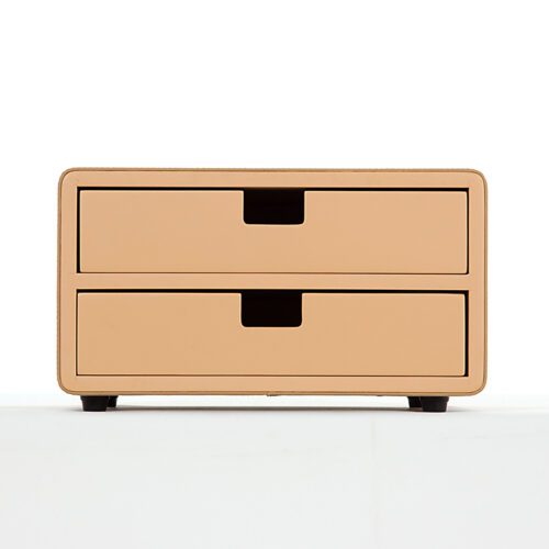 A front-facing professional product shot of a Kempinski branded beige faux leather double-drawer organizer unit with black non-slip feet.