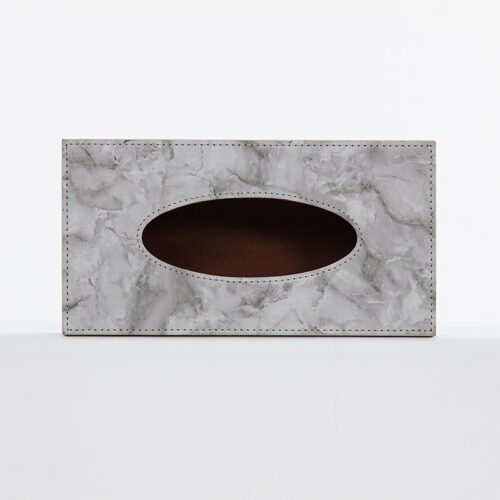 A Sheraton branded luxury hotel tissue box cover featuring a grey marble-patterned faux leather wrap in a rectangular design.