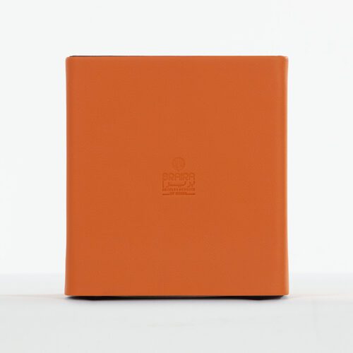 A Braira branded vibrant orange faux leather square tissue box cover with a central debossed logo.