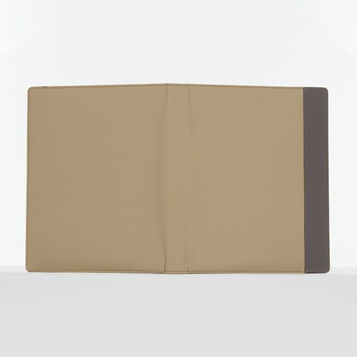 An open bi-fold Marriott branded beige faux leather hotel service directory cover with a grey vertical accent on the right edge.