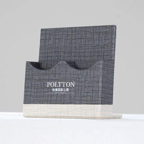 A professional product shot of a POLTTON branded two-tone linen-textured brochure and business card holder.