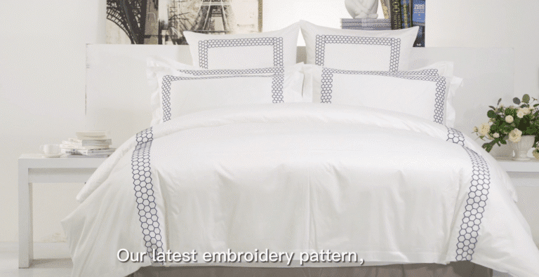 Hexagon Elegance: White Embroidered Bedding for Modern Luxury Hotels
