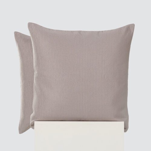 A high-resolution product shot of two Silver-Grey Ribbed Corduroy Pillows featuring a vertical linear texture and a soft shimmering silver finish.