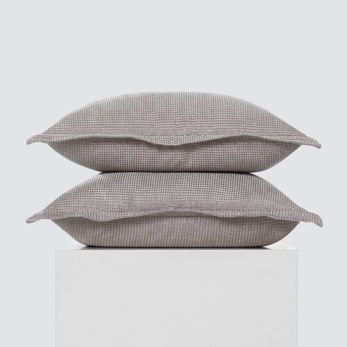 Elevate your home sanctuary with our tactile Warm Grey Waffle-Weave Flanged Pillows. Specifically designed with a deep, honeycomb-inspired waffle texture, these neutral grey cushions provide immediate organic depth and a cozy, contemporary feel. Furthermore, this set includes two plush pillows featuring relaxed flanged borders, combining premium softness with a professional designer aesthetic for modern sofas or bedroom sanctuaries.
