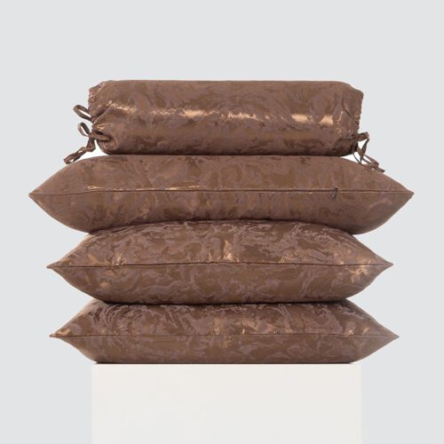 A high-resolution product shot of a Bronze Metallic Distressed Bolster and Pillow Ensemble featuring one decorative neckroll and three rectangular cushions.