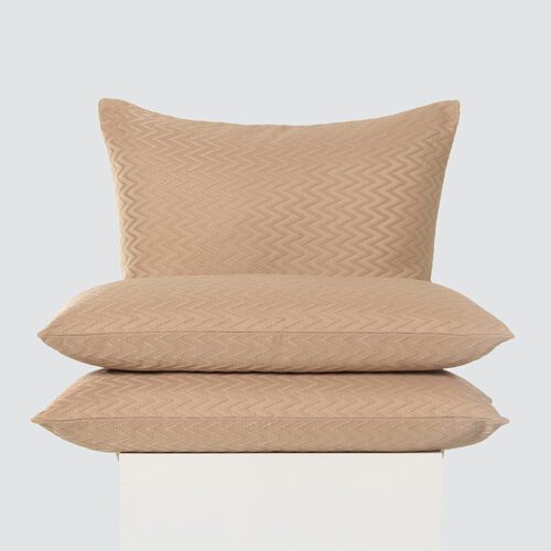 A high-resolution product shot of a three-piece Sand Taupe Zig-Zag Textured Pillow set featuring an all-over embroidered chevron pattern and a soft matte finish.