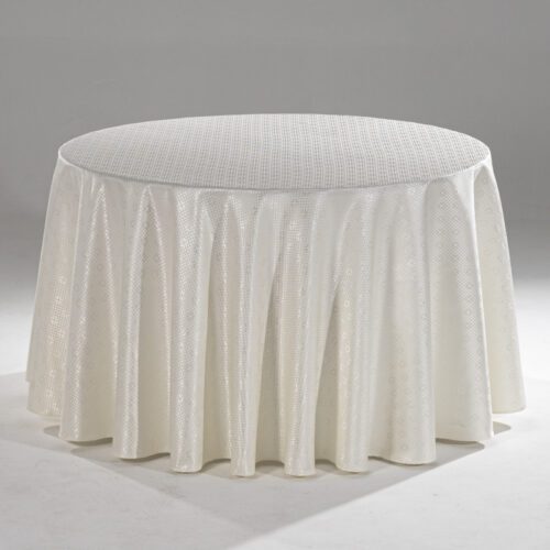 A large white round polyester tablecloth with an intricate grid jacquard pattern draped over a banquet table.