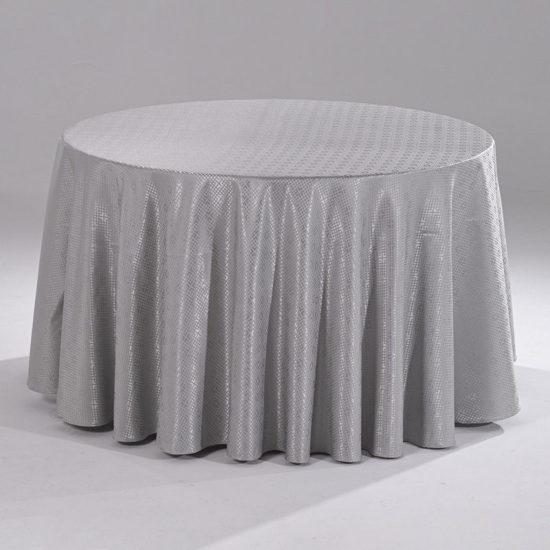 A large silver grey round polyester tablecloth with an intricate grid jacquard pattern draped over a banquet table.