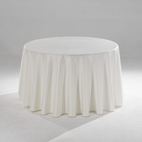 A large white round polyester tablecloth with a subtle raindrop jacquard pattern draped over a banquet table in a professional setting.