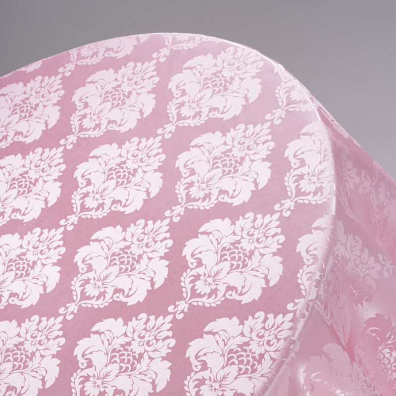 Close-up view of the pink jacquard weave showing the delicate "Starry Floral" textured pattern.