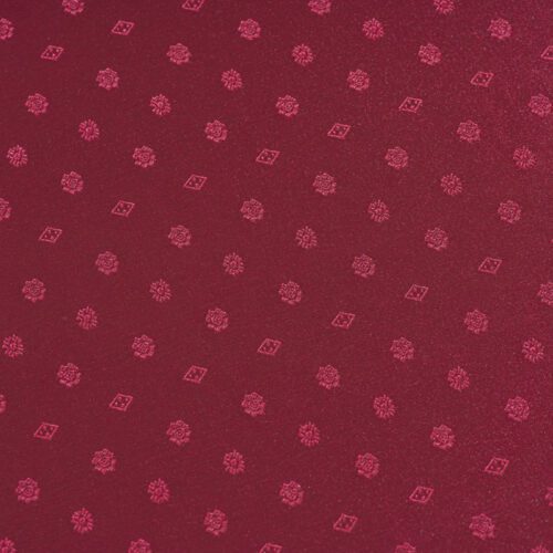 Close-up view of the rich red jacquard weave showing the elegant "Snowflake" floral pattern.