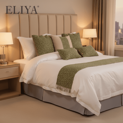 A fully dressed hotel bed featuring crisp white linens, diverse olive green floral accent pillows, and a textured green bed runner.
