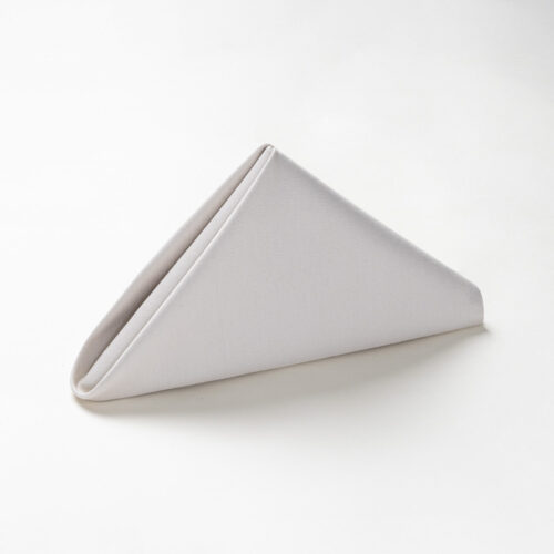 Galaxy premium soft taupe polyester cloth napkin folded in a standing pyramid shape on a clean white background.