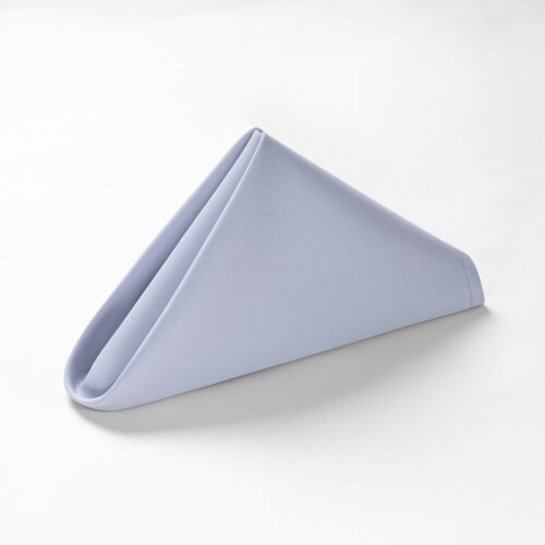 Galaxy premium periwinkle light blue polyester cloth napkin folded in a standing pyramid shape on a clean white background.