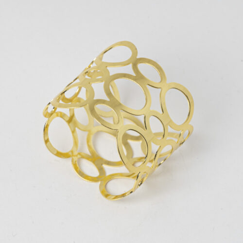 Galaxy modern gold hollow mesh napkin ring holder with geometric oval cutouts on a white background.
