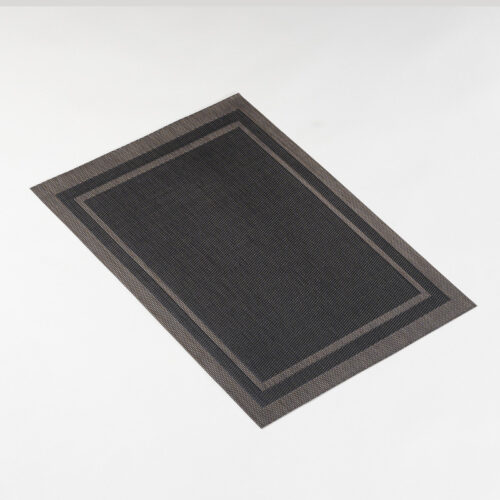 Galaxy premium charcoal black and bronze double-bordered rectangular woven placemat lying flat on a light grey background.