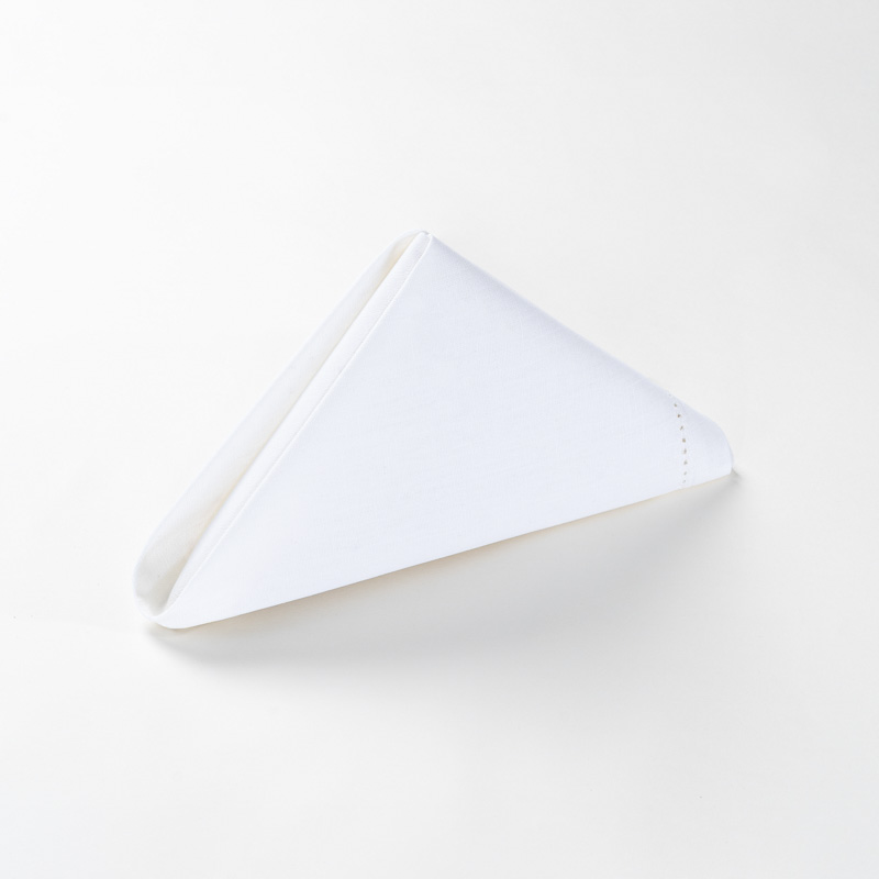 Galaxy premium linen hemstitch border white cloth napkin folded in a standing pyramid shape on a clean white background.