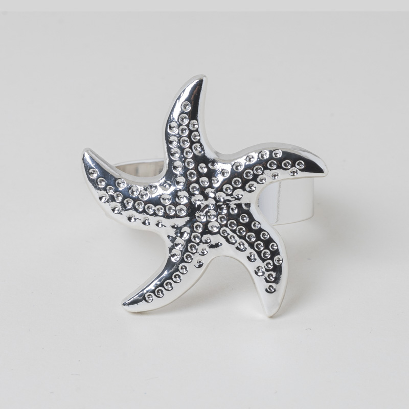 Galaxy nautical silver textured starfish napkin ring holder on a clean white background.