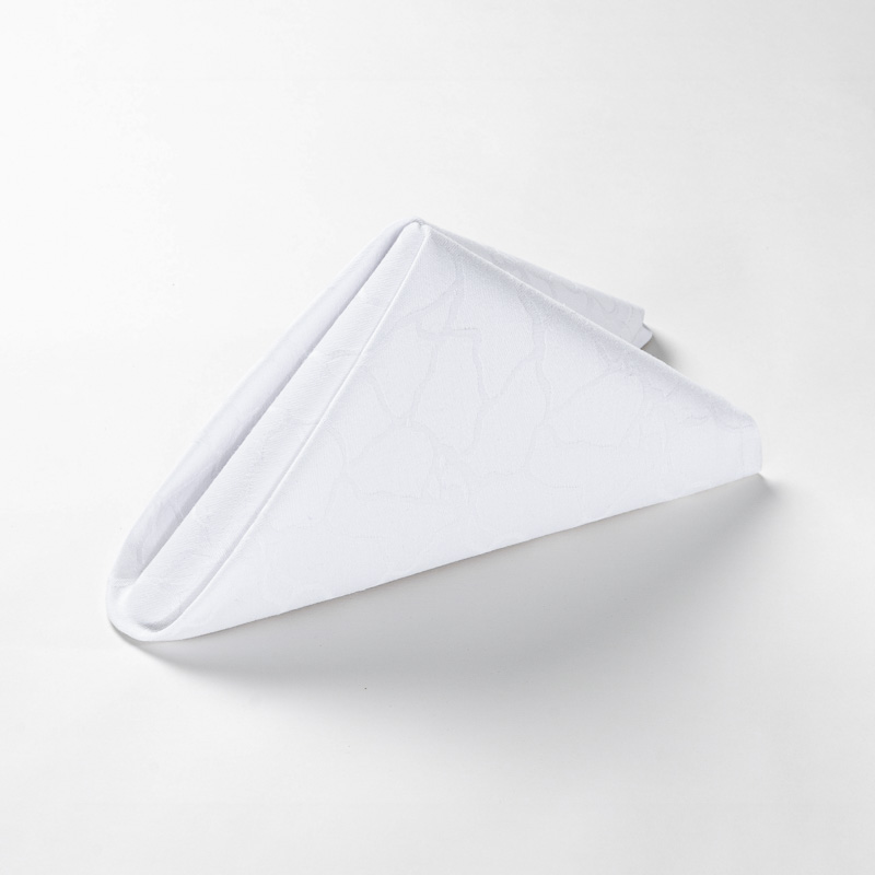 Galaxy premium jacquard textured white polyester cloth napkin folded in a standing pyramid shape on a clean white background.