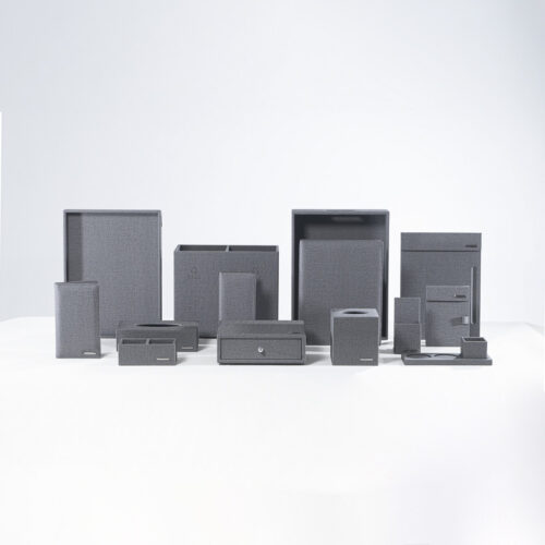 Galaxy executive grey woven fabric hotel room accessories set neatly displayed on a clean white background.