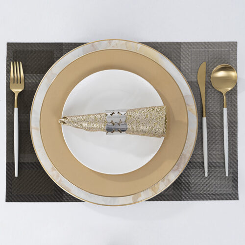 Galaxy premium charcoal black and silver color-blocked PVC woven rectangular placemat with formal place setting on a white background.