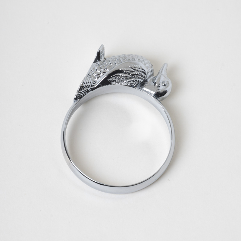 Galaxy novelty silver bird napkin ring holder with textured feather detail on a clean white background.