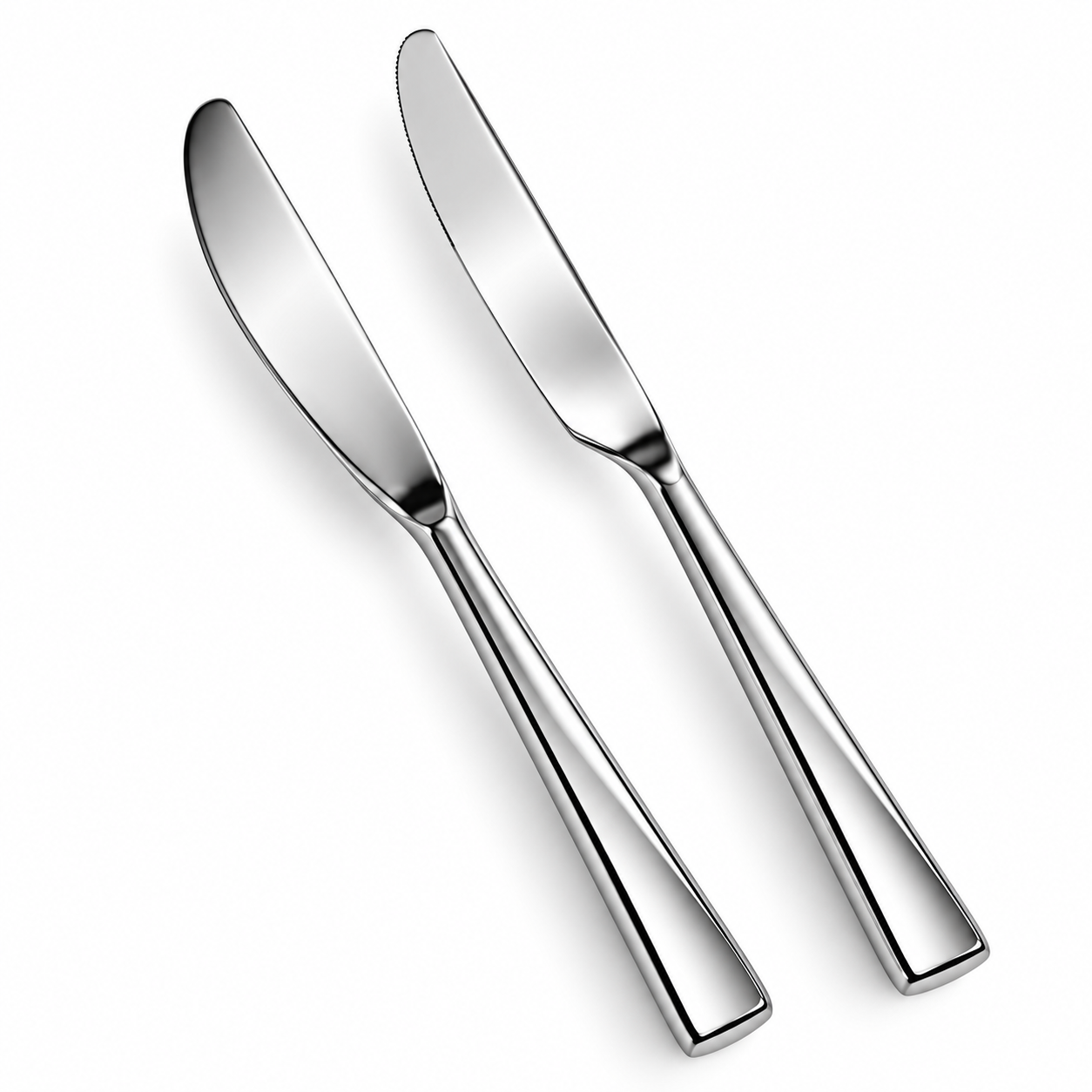 Two mirror-polished stainless steel dinner knives showing a smooth edge butter knife and micro-serrated steak knife on a white background.