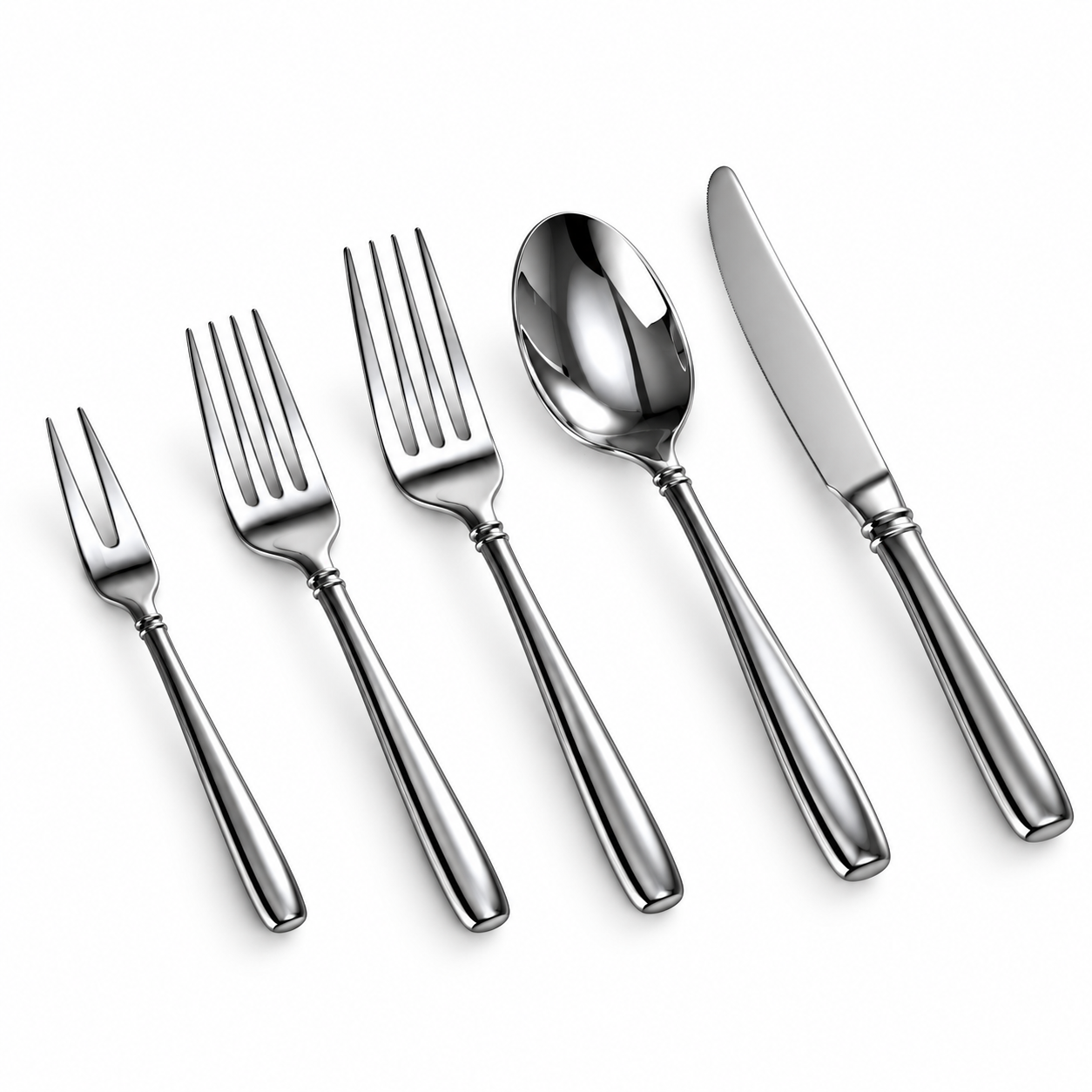 Five mirror-polished stainless steel cutlery pieces including a fruit fork, salad fork, dinner fork, dinner spoon, and dinner knife.